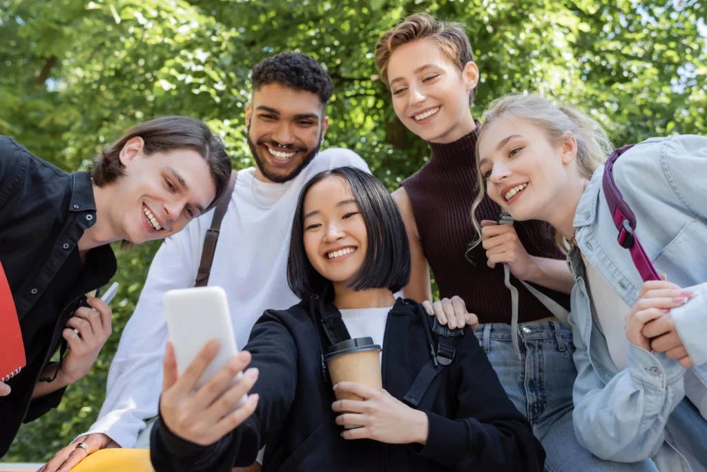 students taking picture after university sexual assault prevention programs