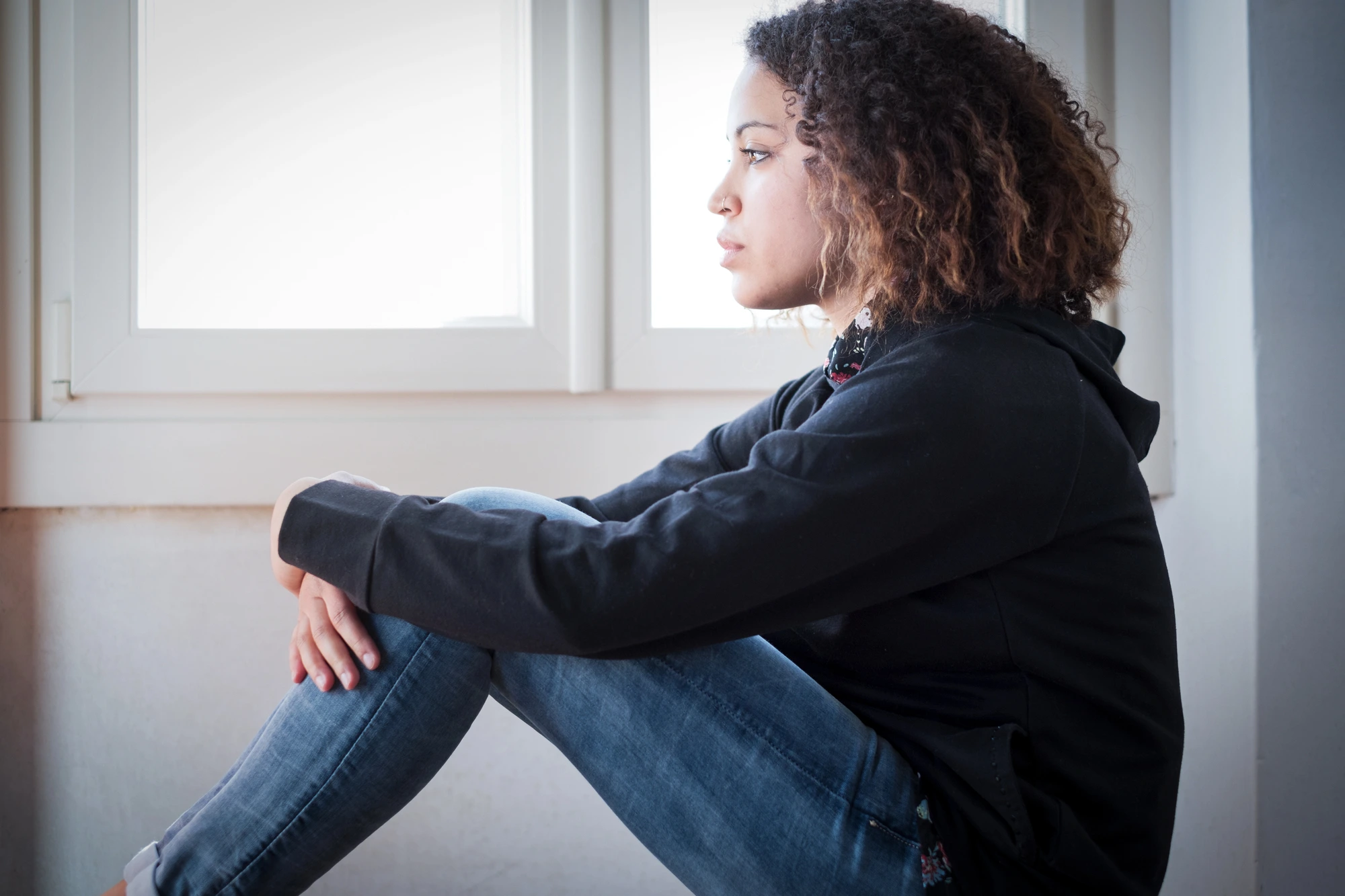 sad woman who might benefit from sexual assault awareness programs