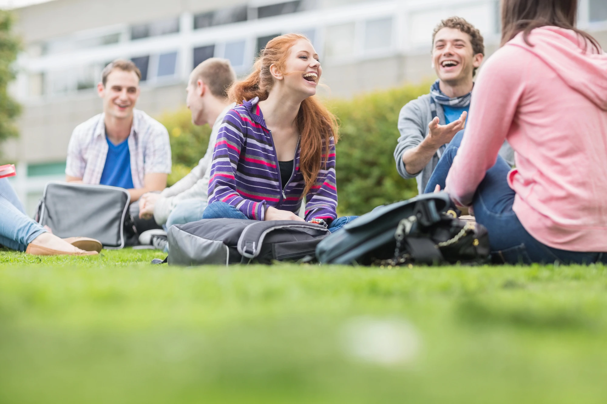 students outside after class on sexual assault prevention in higher education